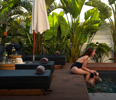 Couple in private villa pool